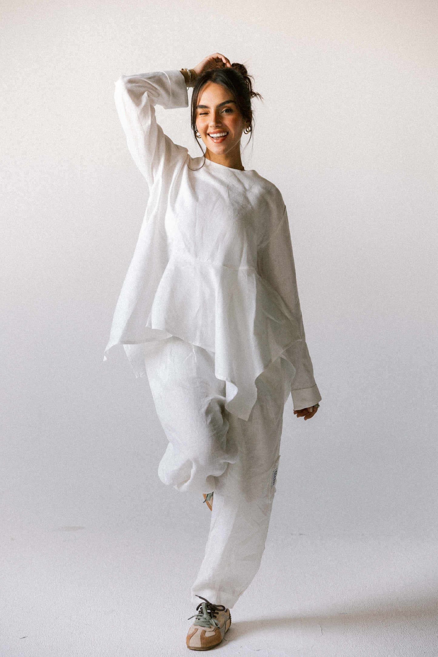 Ruffeled linen top in off-white