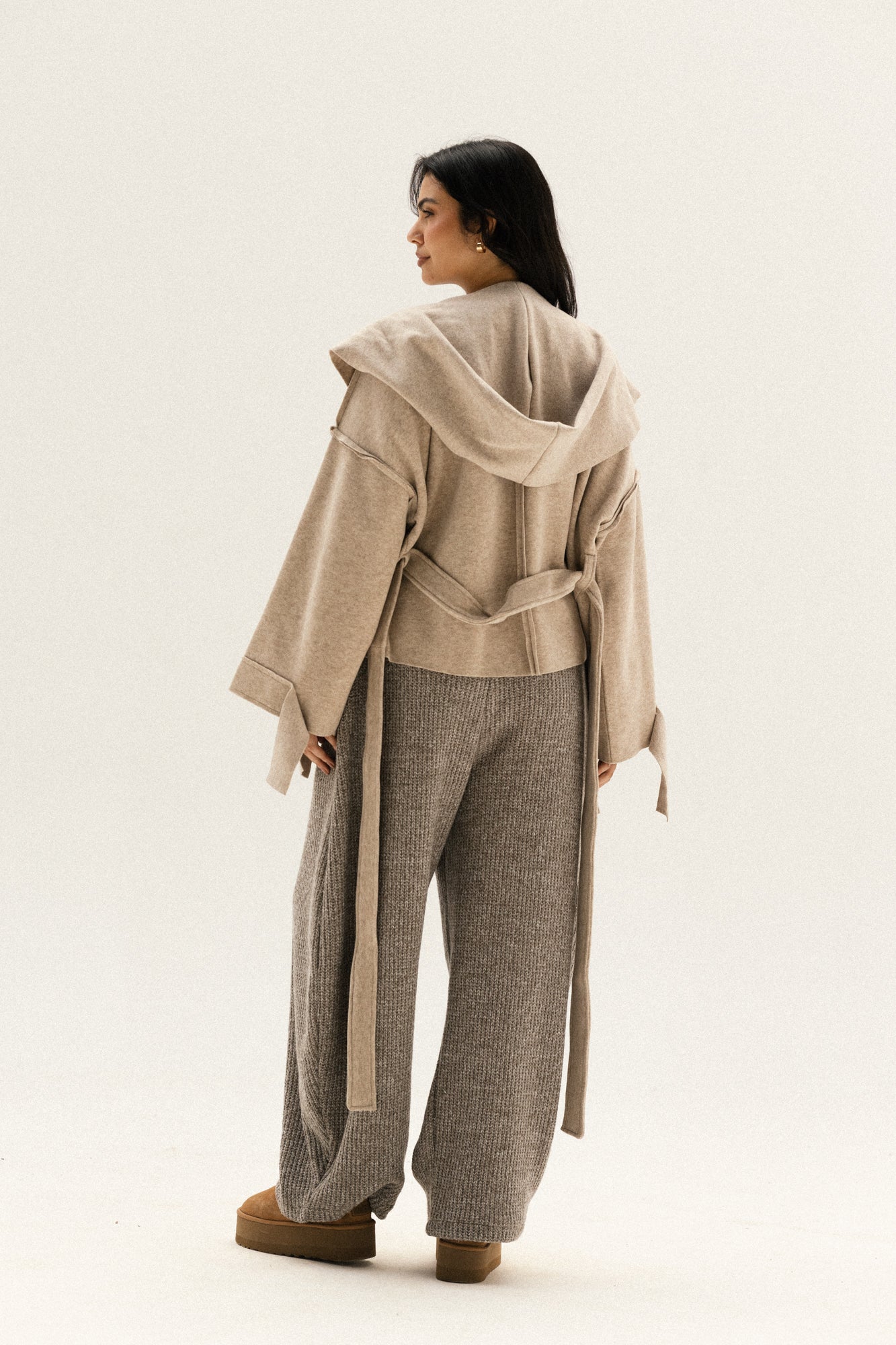 Unfinished short coat in cafe