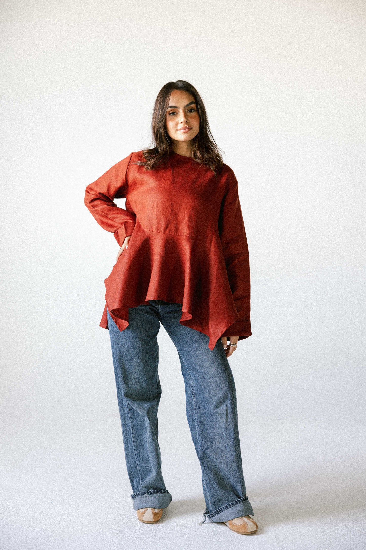Ruffeled linen top in burnt red