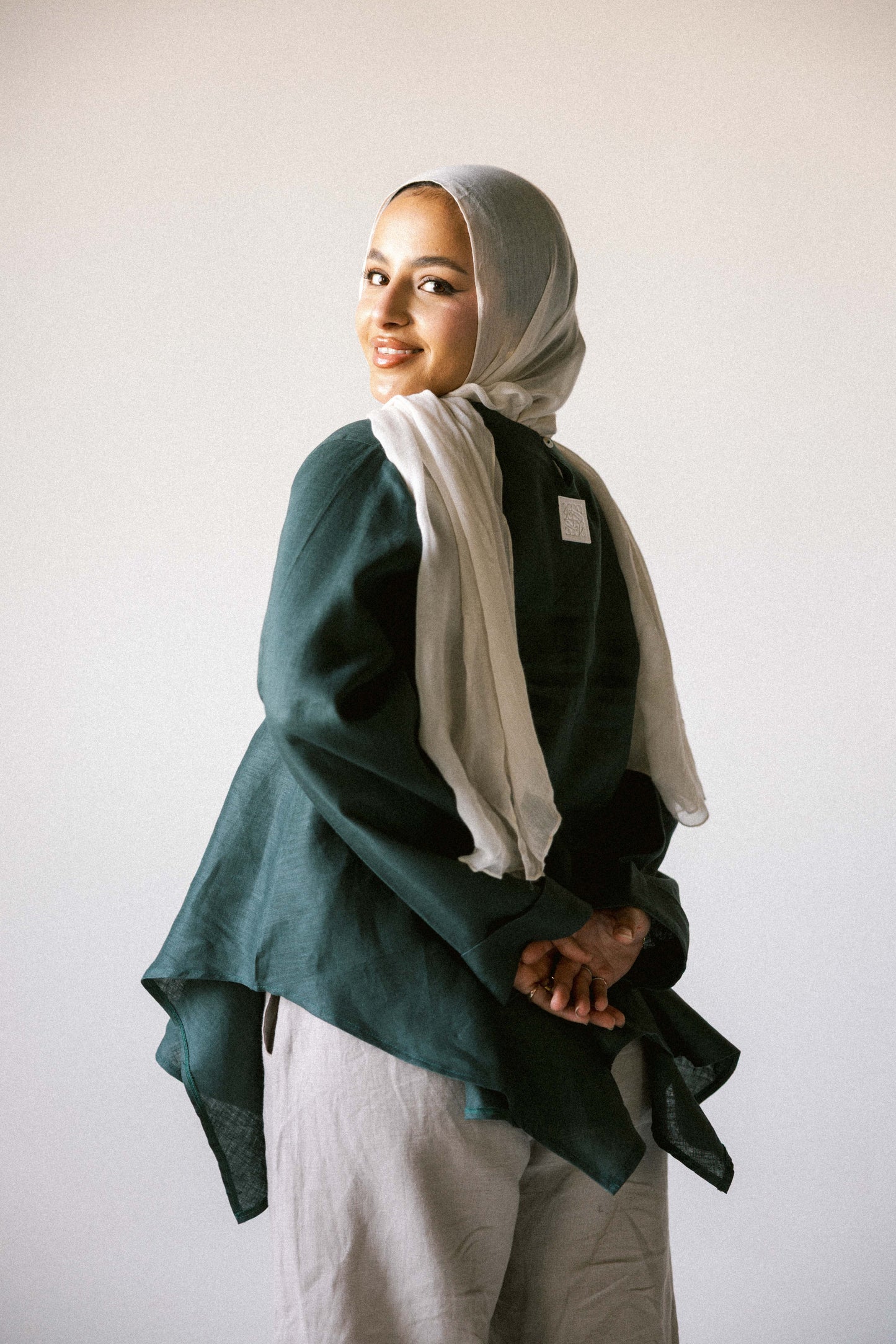 Ruffeled linen top in dark-green