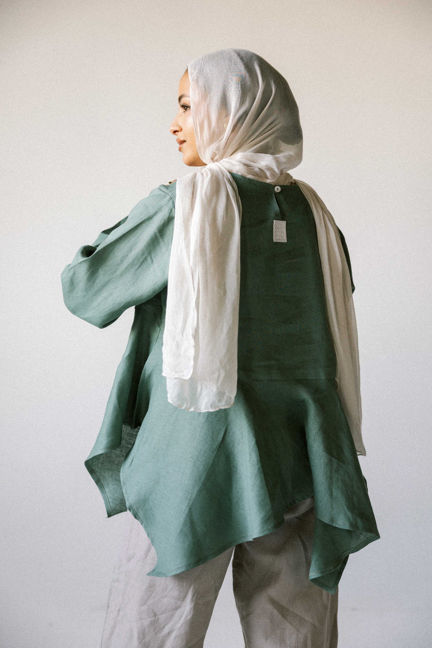 Ruffeled linen top in pistachio