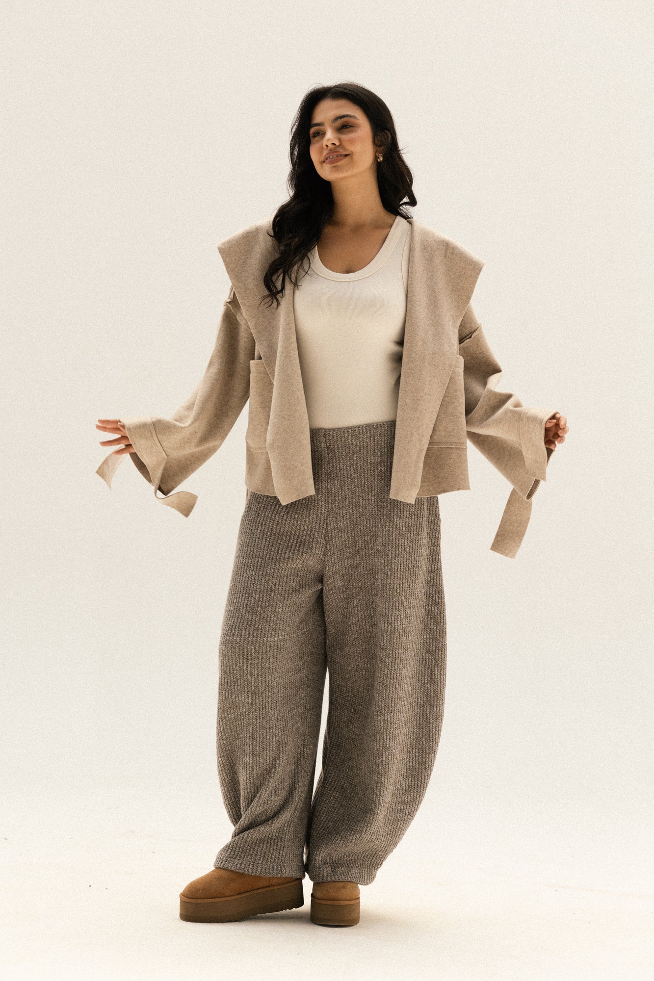 Unfinished short coat in cafe