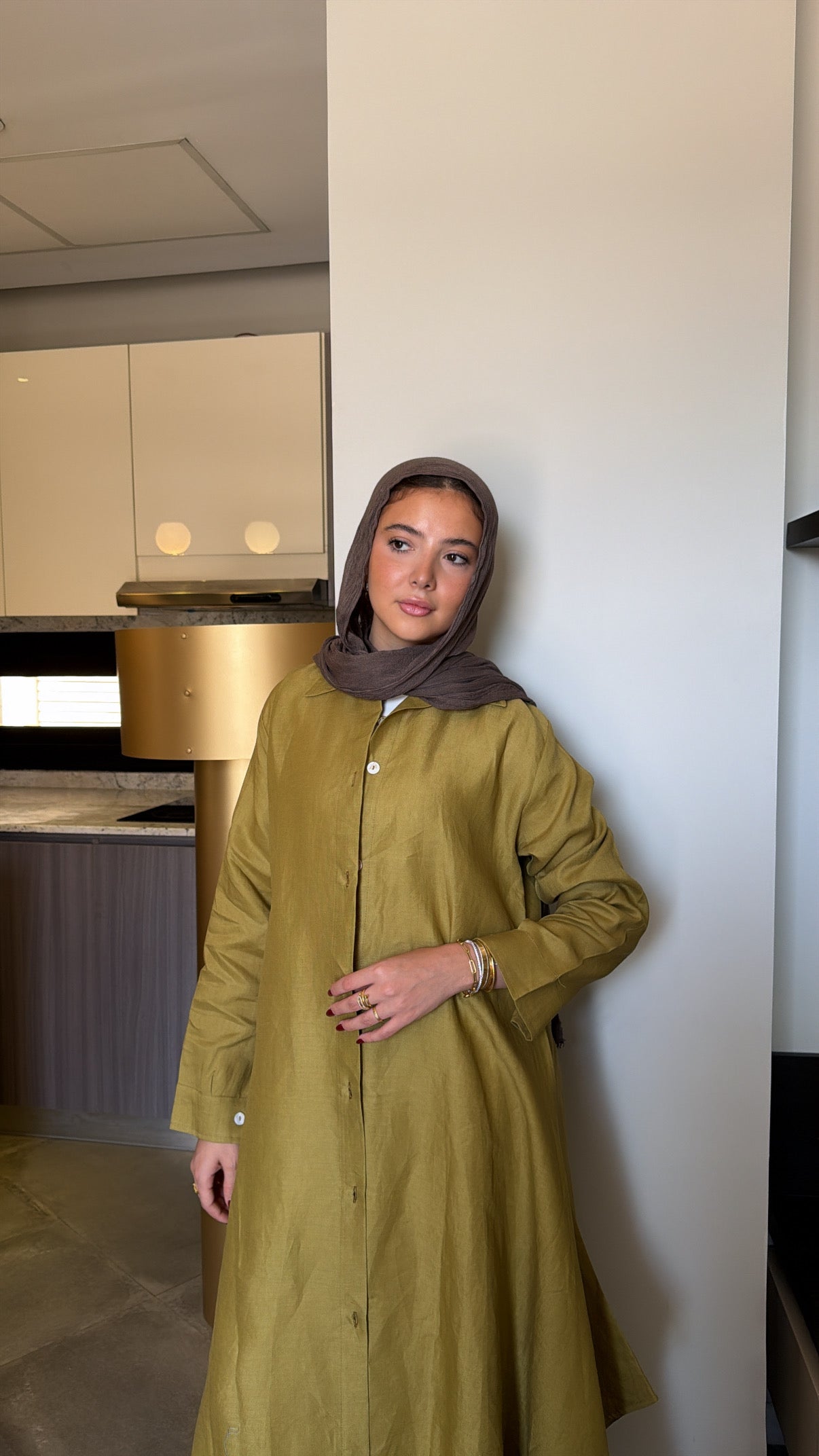 Long shirt in dark lime-green