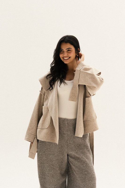 Unfinished short coat in cafe