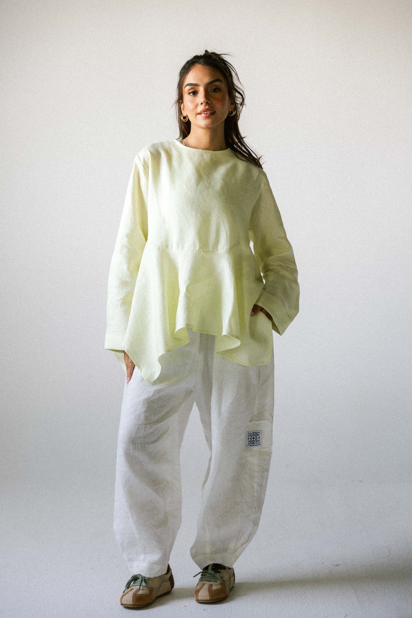 Ruffeled linen top in butter yellow