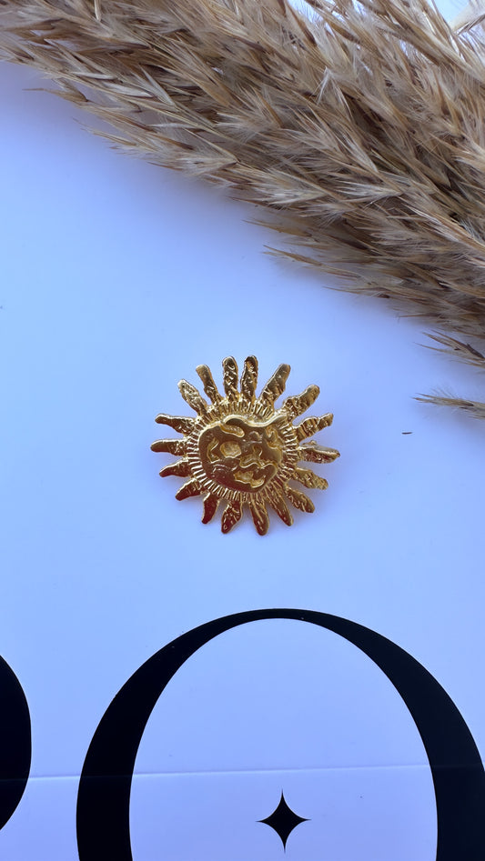 Sun brooch