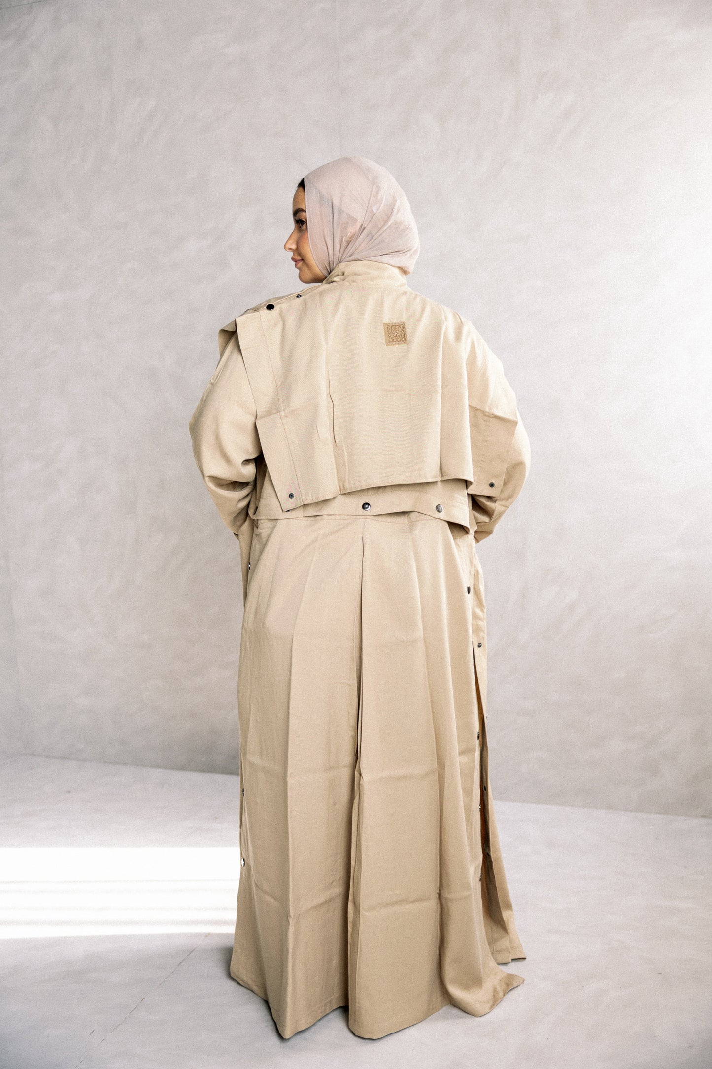 Jouzoor tensile coat in cafe