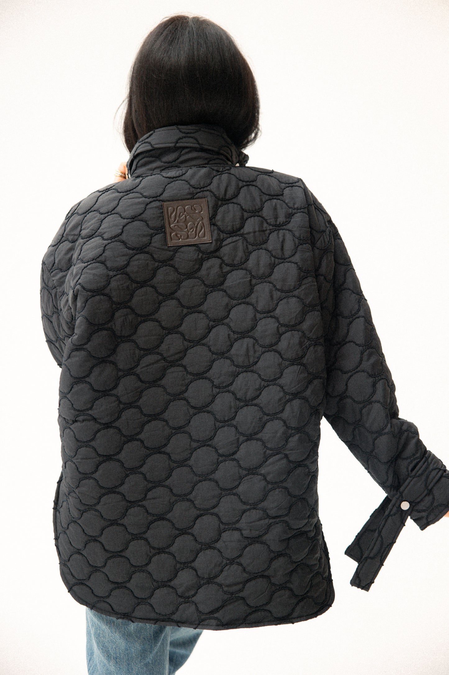 Pocket puffer jacket in black