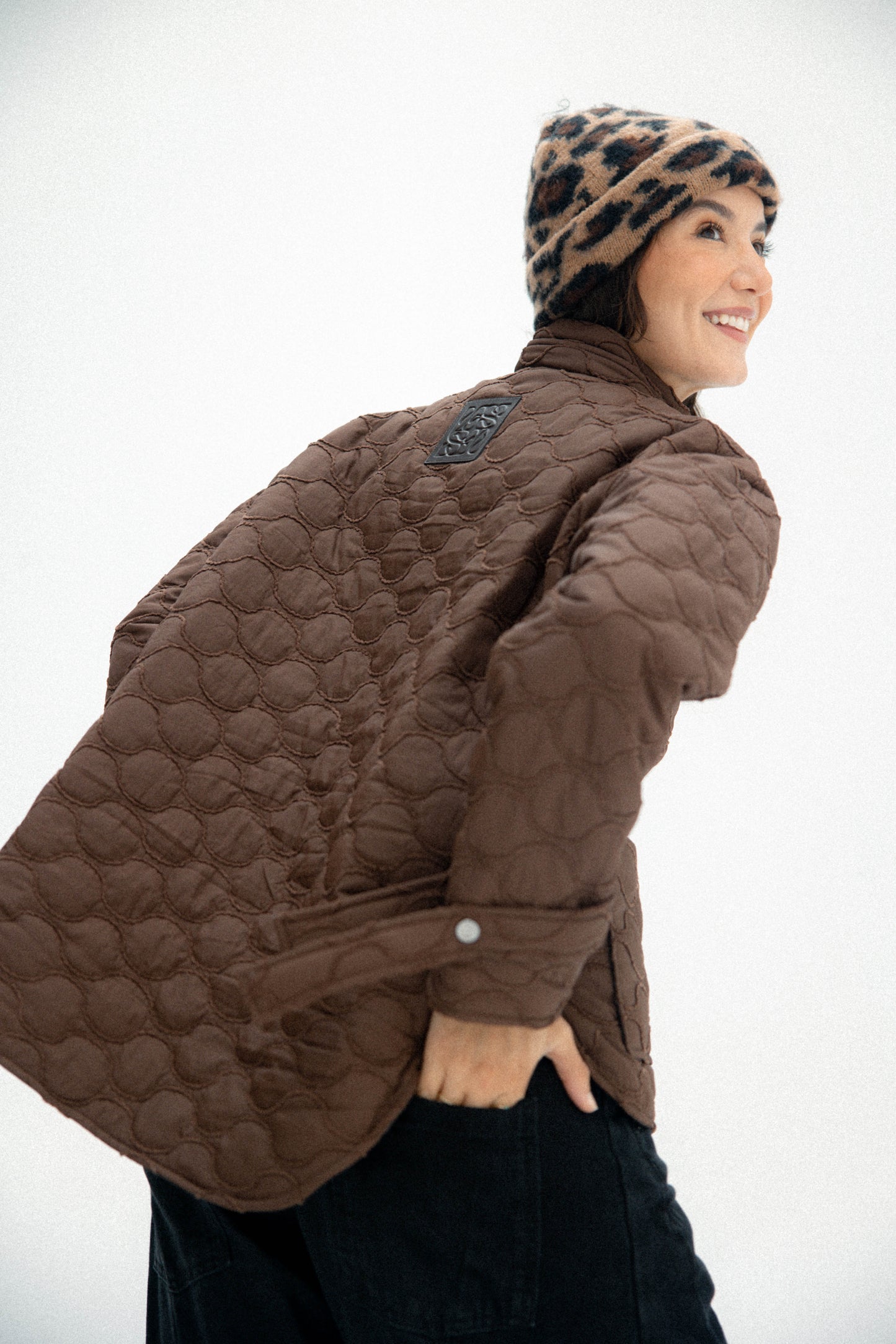 Pocket puffer jacket in brown
